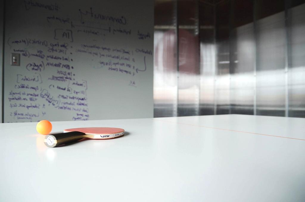 Modern workspace with planning materials and natural lighting representing systematic lifestyle approach